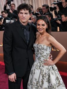 Mila Kunis, Ešton Kučer