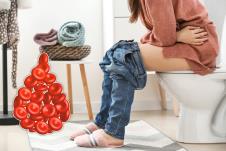 malda žena sedi na wc šolji/kap krvi