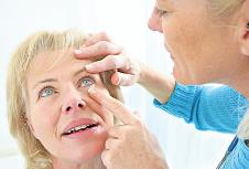 stockphotoseniormedicalcheckupwithfocusoneyesexamination163010027.jpg