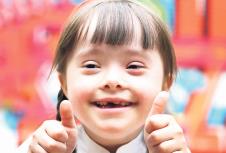 stockphotoportraitofbeautifuldisabledgirlthatgivingthumbsup529284664.jpg