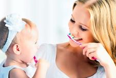 stockphotohappyfamilyandhealthmotheranddaughterbabygirlbrushingtheirteethtogether158016329.jpg