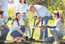 stockphotovolunteeringcharitypeopleandecologyconceptgroupofhappyvolunteersplantingtreeand428932453-copy.jpg