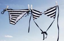 stockphotofemaleswimsuitdryingontheclothesline35661328.jpg