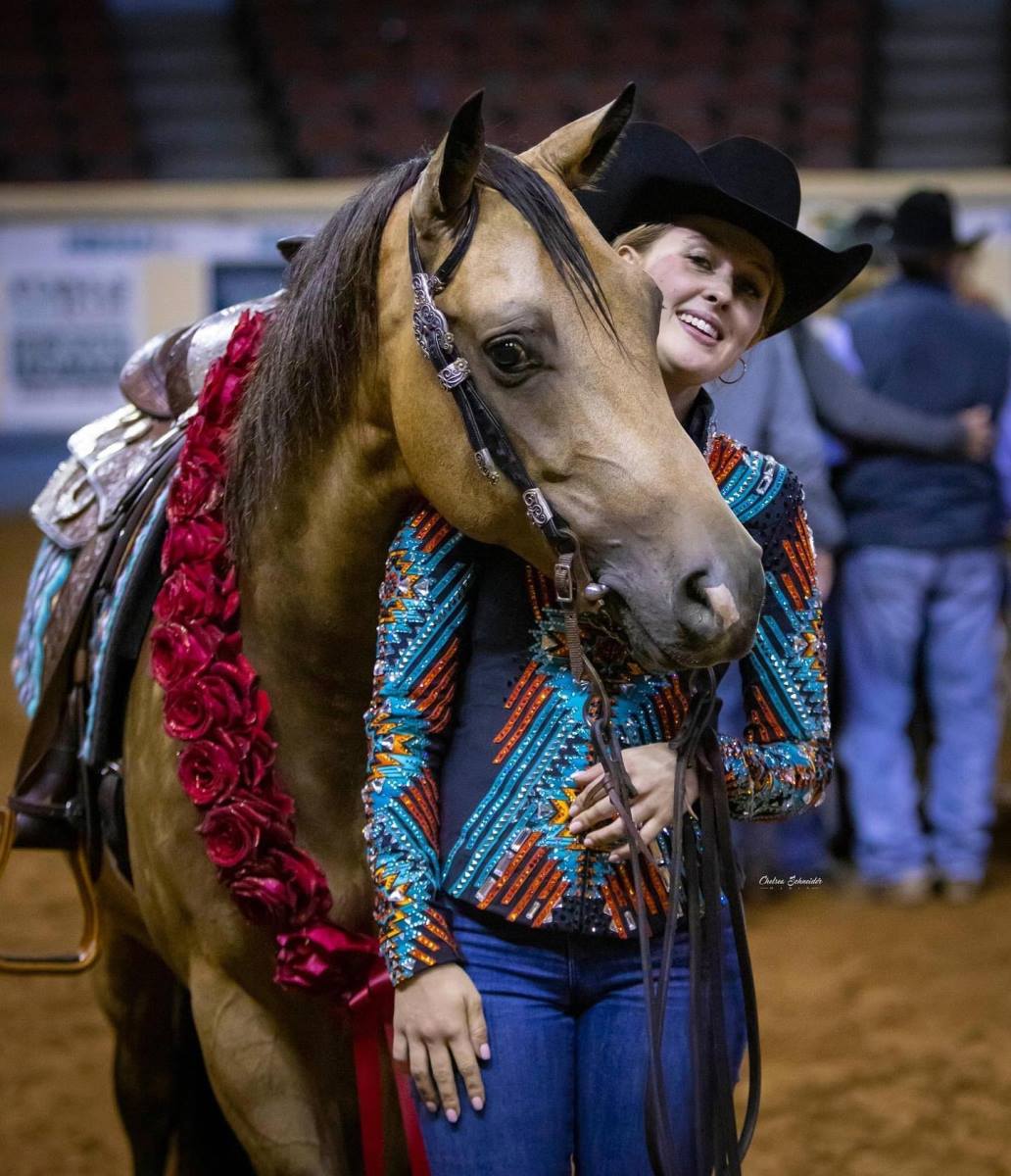 Đina Šumaher na jednom takmičenju u jahanju