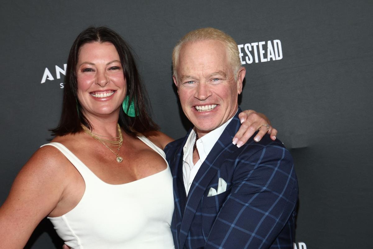 Nil Mekdona sa suprugom.jpg