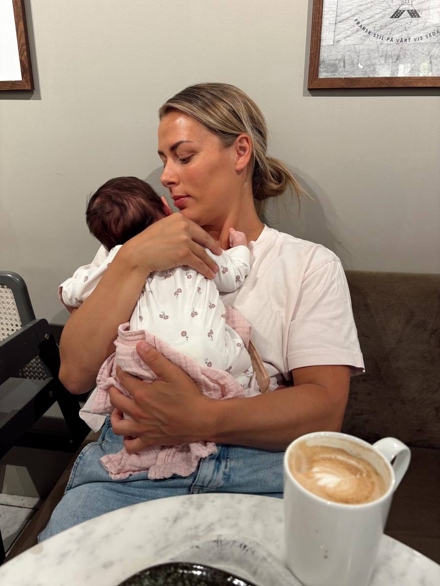 Nora Merk sa ćerkicom