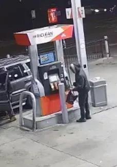 reed-fills-small-container-gas-1040087474 copy.jpg