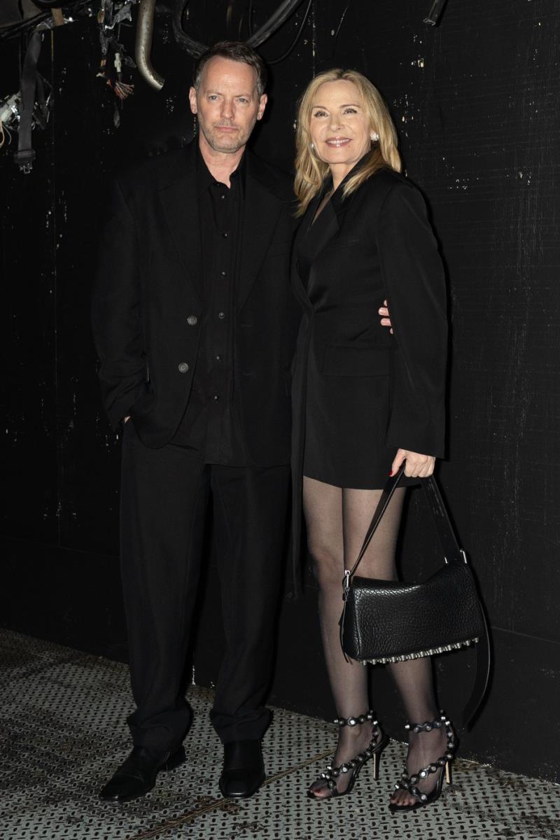 Kim Katral, Rasel Tomas