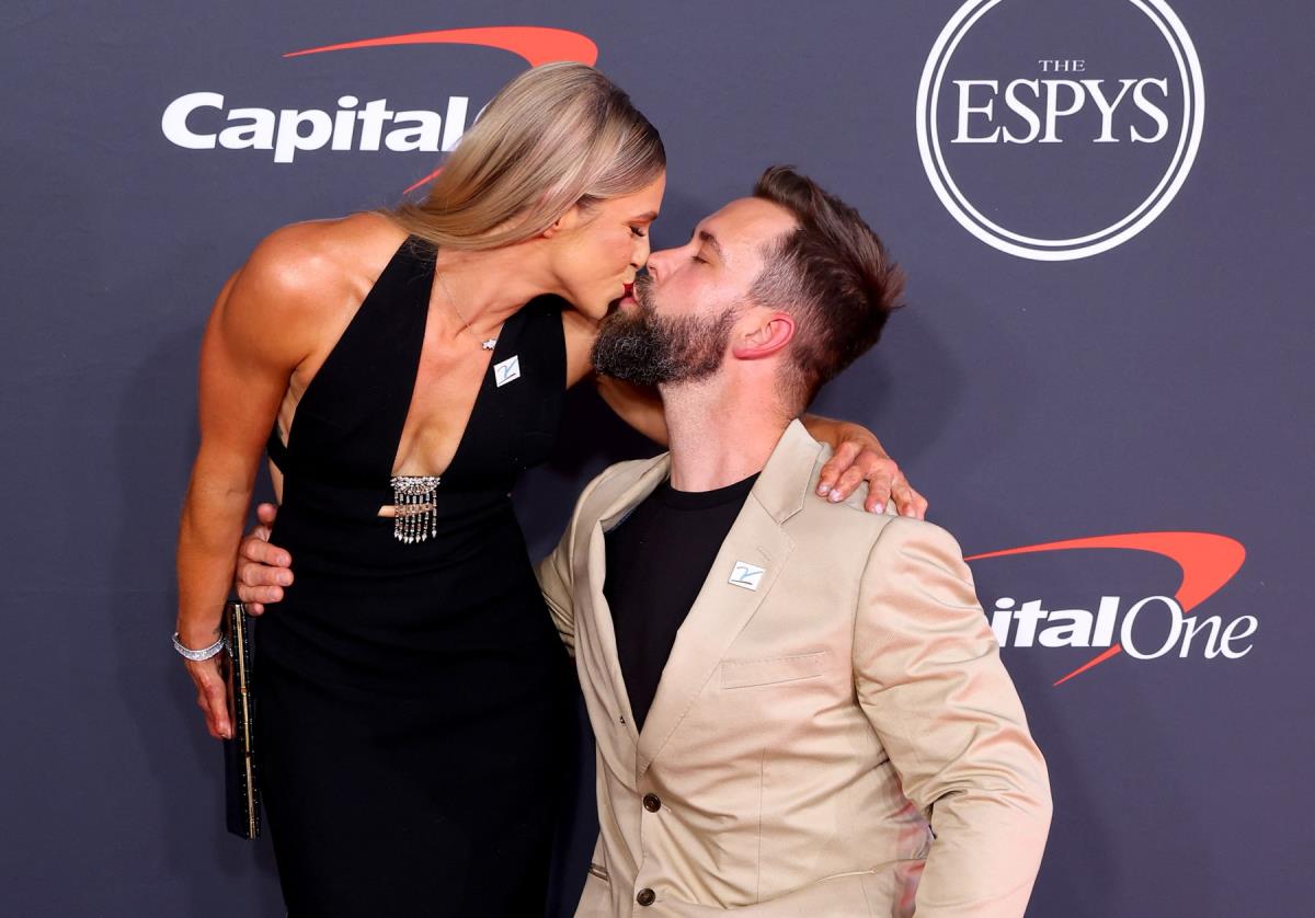 Oksana Masters sa mužem