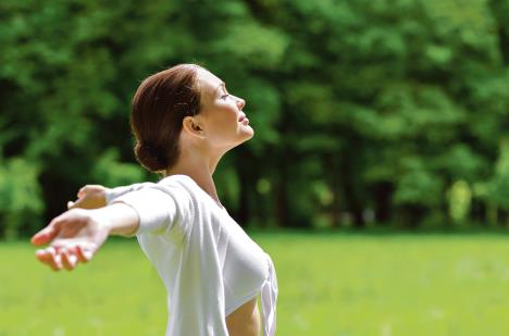 stockphotoprofileofwomanwithoutstretchedarmsandeyesclosedconceptofhealthylifestyleandrelaxation158433260.jpg