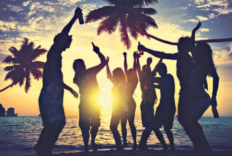 stockphotopeopleenjoyingpartybythebeach228592444.jpg