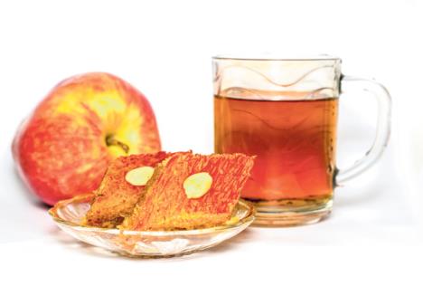 stockphototeaappleandthesweetnessofthebaklavaonawhitebackground353991104.jpg