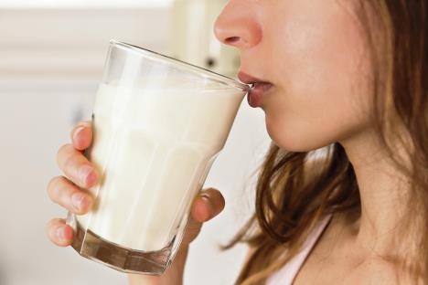 stockphotowomandrinkingmilk362409509.jpg