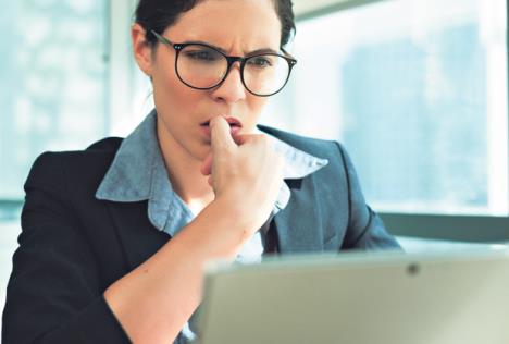 stockphotoanxiousstressedwhiteyoungwomanbitingherfingernailswhilereadingfromthecomputerscreen1271179669.jpg