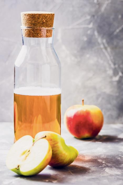 fraj-stockphotospiceddetoxappleciderdrinkinabottleselectivefocusspacefortext737648866.jpg