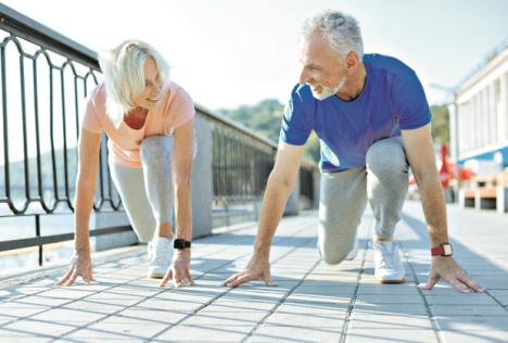 stockphotocheerfulseniorcouplebeinginstartingposition713828560.jpg