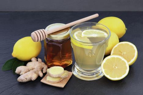 stockphotocoldandfluremedyreliefdrinkwithgingerlemonandhoneyoverslatebackground331292951.jpg