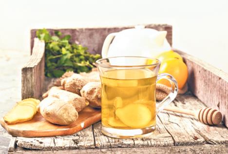 stockphotogingerteawithlemonandherbs1225147675.jpg