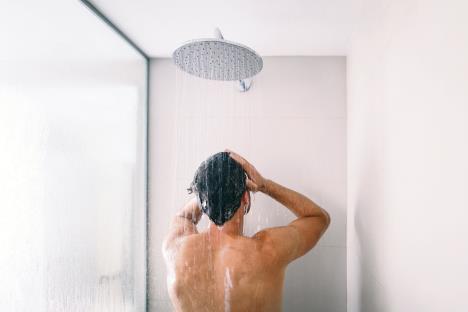 stockphotomantakingashowerwashinghairwithshampooproductunderwaterfallingfromluxuryrainshower1414258355-13-12-2019.jpg