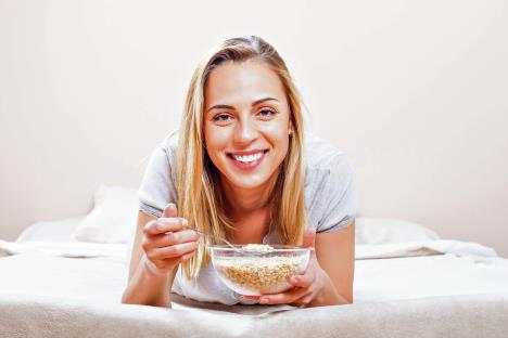 stockphotobeautifulwomanishavingbreakfastinbedhealthybreakfast351449885.jpg