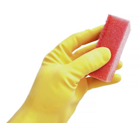 stockphotohandinyellowglovewithspongeisolatedonwhitebackground71589091.jpg