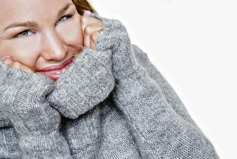 stockphotosmilinggirlinawarmsweater19350424.jpg