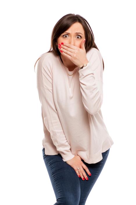 fraj-stockphotoashamedyoungwomanneedatoiletonwhitebackground1028056552.jpg