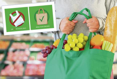 stockphotocustomerholdreusablegreenshoppingbagwithfruitandvegetableoversupermarketaisleblur1257013726.jpg