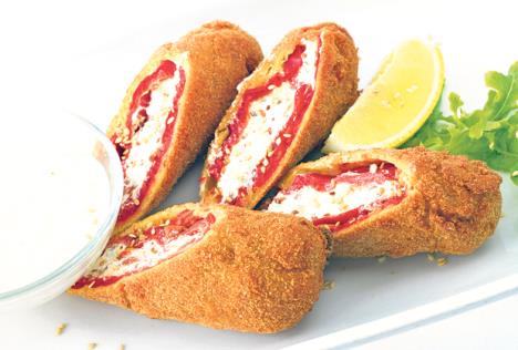 stockphotobreadeddeepfriedpeppersrollledandstuffedwithcheese150352055.jpg