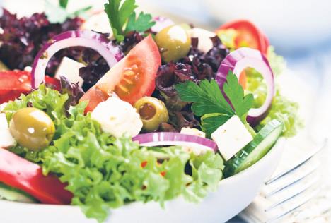 stockphotogreeksaladwithjuicytomatoesfetacheeselettucegreenolivescucumberredonionandfresh85160287.jpg