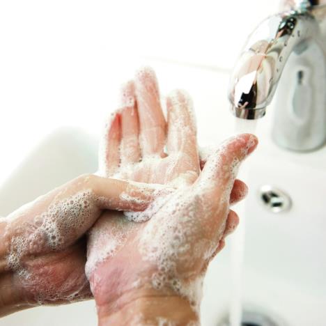 stockphotowashingofhandswithsoapunderrunningwater102093391.jpg