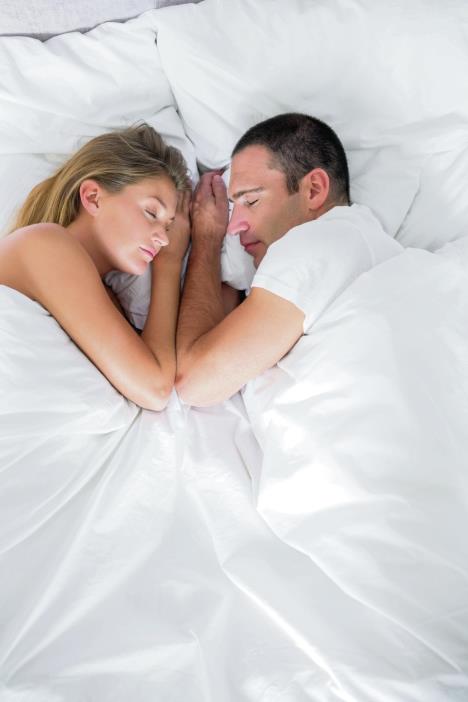 stockphotocutecouplelyingasleepinbedoverheadshotathomeinbedroom150109061.jpg