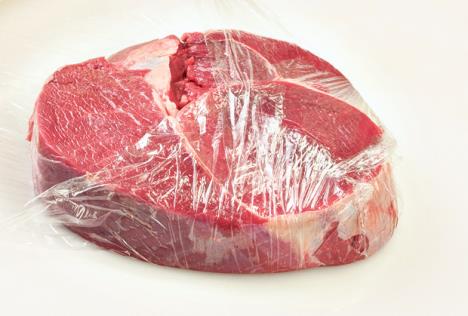 stockphotopieceofmeatwrappedinclearfilmforprotection352408907.jpg