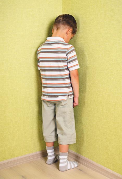 stockphotolittlechildboywallcornerpunishmentstanding113941708.jpg