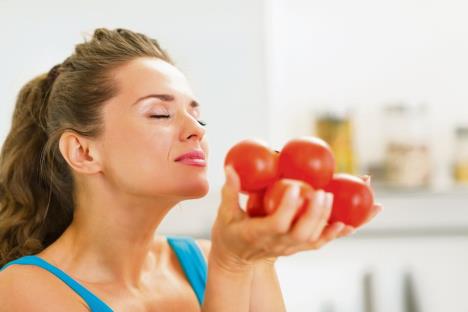 fraj-stockphotoyounghousewifeenjoyingbunchoffreshtomato156081905-1199-800.jpg