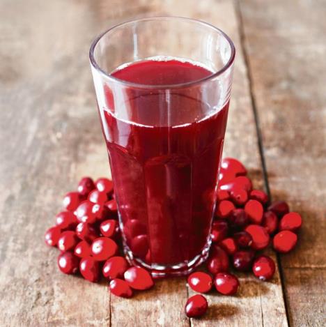 stockphotoaglassofcranberryjuiceonawoodenbackground1569150175-1-11-03-2020.jpg