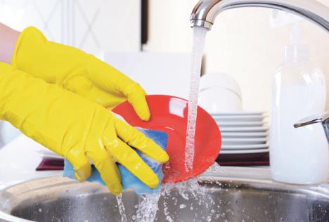 stockphotocloseuphandsofwomanwashingdishesinkitchen163071884.jpg