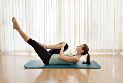 1-stockphotolegstretchexerciseonyogamat621518099.jpg