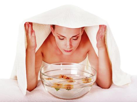 stockphotofacialmassagewithsteamtreatmenttowelonhead247617079.jpg