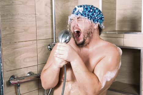 stockphotofunnyfatmansingsintheshower1318442921.jpg