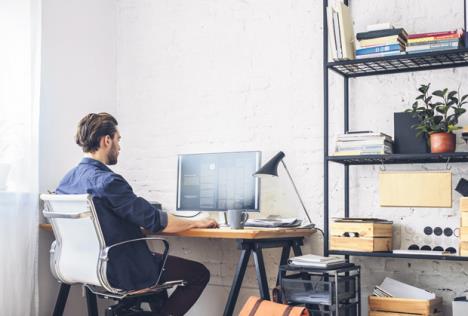 stockphotoyoungmanworkingonhiscomputer737459251.jpg