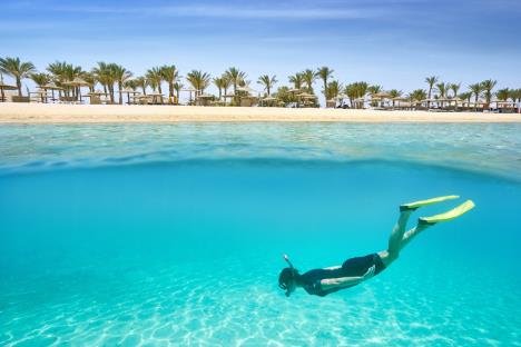 stockphotoyounggirlswimsintheshallowbaymarsaalamresortredseaegypt288797549.jpg