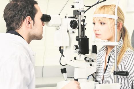 0815-stockphotoeyedoctorperforminganeyeexamination125752625.jpg