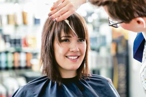 stockphotohairdressercuttingwomanhairinshop302377649-1200-800.jpg