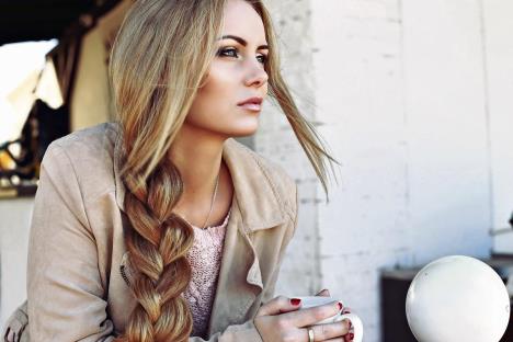 stockphotooutdoorphotoofbeautifulblondwomanwithlonghairandperfectmakeupwearingknittedsweater243274207-1200-800.jpg