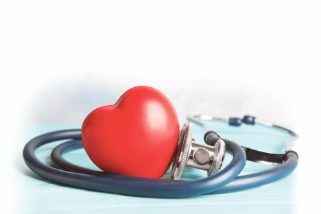 stockphotostethoscopeandredheartonwoodentablecardiologyconcept1268764030.jpg