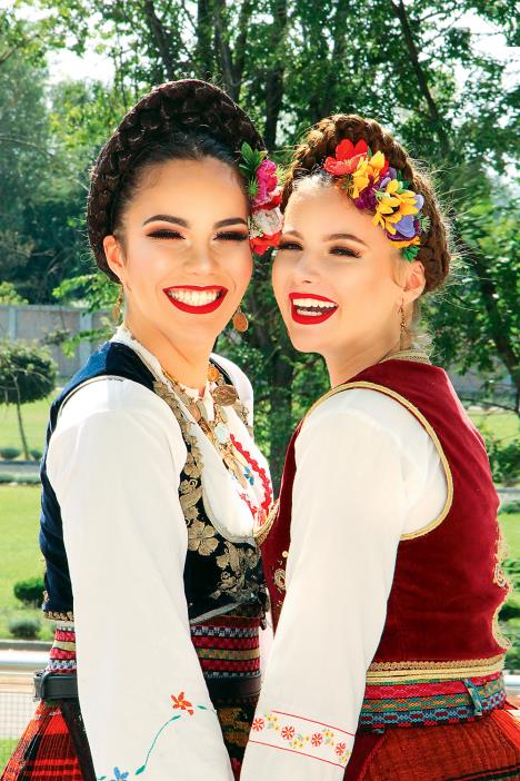 stockphototwobeautifulsmilinggirlsinserbiannationalcostumesfolkdancetraditionconceptbelgrade1567975552.jpg