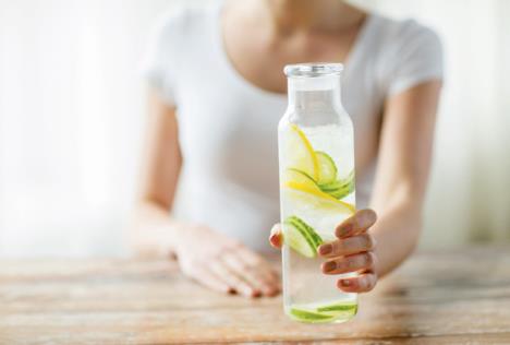 stockphotohealthyeatingdrinksdietdetoxandpeopleconceptcloseupofwomanwithfruitinfusedwater281445404.jpg