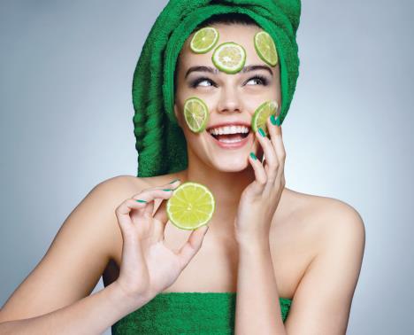 stockphotolimemaskbeautifulgirlholdingasliceoflimeandsmilingphotoofgirlwithflawlessskinin1044244309.jpg