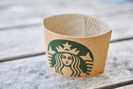 brownstarbuckspaperongraywoodensurface1435750.jpg